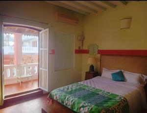 Giường trong phòng chung tại Madame de Lally homestay