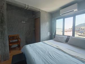 Postel nebo postele na pokoji v ubytování Poohry Seaview + 145 fotografií