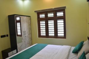 Fotografie z fotogalerie ubytování De Waves v destinaci Varkala