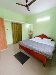 Postel nebo postele na pokoji v ubytování Patliputra Vihar