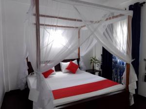 Postel nebo postele na pokoji v ubytování Ocevia - Tangalle