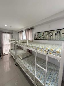 Ένα ή περισσότερα κρεβάτια σε δωμάτιο στο Penthouse A Near IT Park