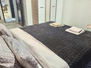 En eller flere senge i et værelse på Apartman Bedem + 29 billeder