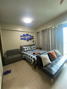 Et opholdsområde på Two Palm Tree Villas By Khaye