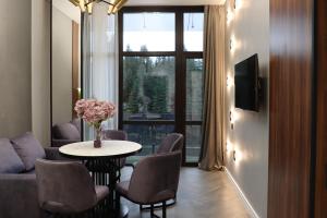 TV a/nebo společenská místnost v ubytování VILSON hotel