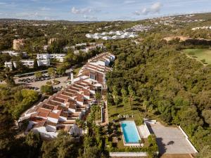 an aerial view of a resort with a swimming pool at Hotel Encinar de Sotogrande in Sotogrande +48 photos