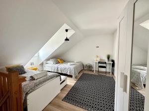 En eller flere senge i et værelse på Appartement 2 chambres