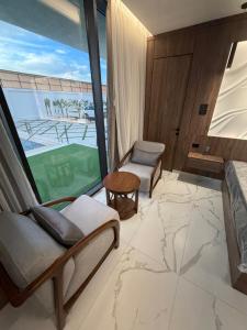 Postel nebo postele na pokoji v ubytování Alma chalets + 42 fotografií