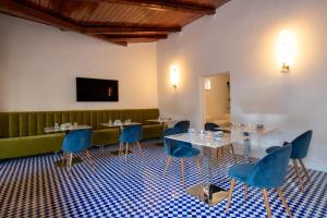 TV a/nebo společenská místnost v ubytování Villa Bellarosa