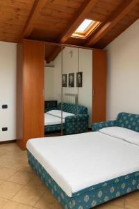 Postel nebo postele na pokoji v ubytování Trevisan + 26 fotografií