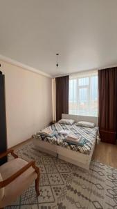 Una cama o camas en una habitación de Apartment Bosteri Beach 9 fotos más