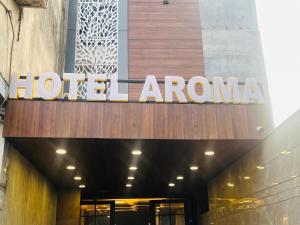 a hotel amazon sign on the front of a building at Hotel Aroma - Chattarpur in Gurgaon