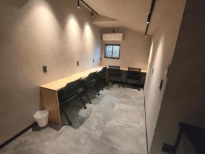 an overhead view of a waiting room with chairs at Fukuchiya in Fujiyoshida