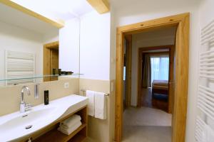 Koupelna v ubytování Atelier Ronacher + 57 fotografií