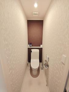 Et badeværelse på Osaka Lodge Midori - Designer House by Mitsui Home + 38 billeder