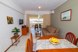 a living room with a table with bananas on it at Amadolia in Loutra Edipsou