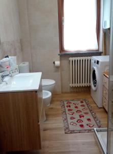 Koupelna v ubytování Appartamento Verdenatura