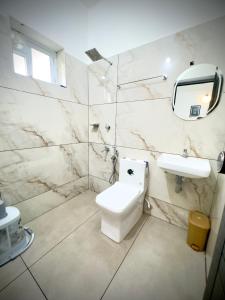 Koupelna v ubytování Tokyoz Inn Calicut