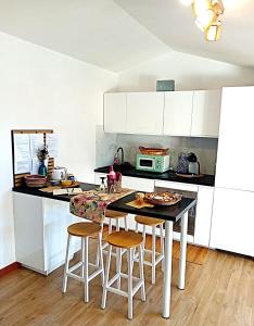 Kuchyň nebo kuchyňský kout v ubytování La Dimora di Deborah