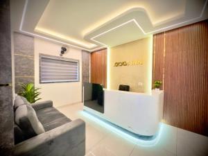 Posezení v ubytování Tokyoz Inn Calicut