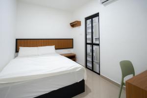 Postel nebo postele na pokoji v ubytování TEBRAU 11 Guesthouse