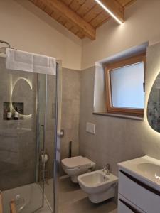 Et badeværelse på La Corte dell'Angelo - Rooms