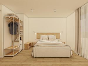 Rúm í herbergi á Hotel Rosamar - Emar Hotels +65 myndir