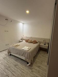 Ένα ή περισσότερα κρεβάτια σε δωμάτιο στο Aime Paine