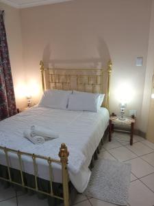 Postel nebo postele na pokoji v ubytování VSA SELF CATERING units 1 and 2