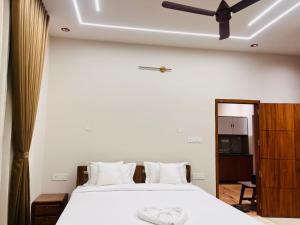 En eller flere senge i et værelse på ILA Beach residency