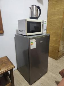 Kuchyň nebo kuchyňský kout v ubytování Hotel Trinidad Flores