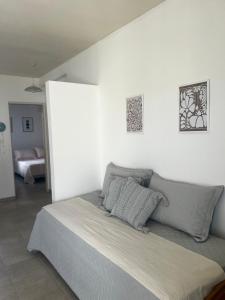 En eller flere senge i et værelse på MGMadryn