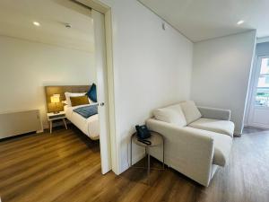 Et opholdsområde på Rossio Garden Suites