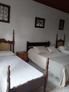 Postel nebo postele na pokoji v ubytování Aconchego Vilela