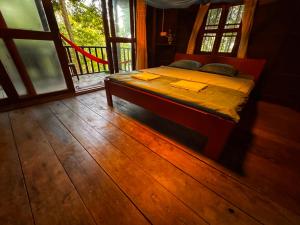 Postel nebo postele na pokoji v ubytování Prey Apsara Bungalows + 3 fotografie