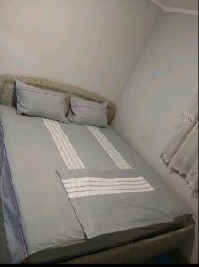 Postel nebo postele na pokoji v ubytování Stan na dan Ugljevik Centar