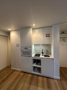 Køkken eller tekøkken på Rossio Garden Suites