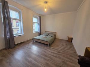 Giường trong phòng chung tại Ari Prop-Urban cozy apartment in Freiberg