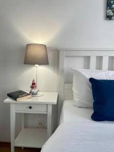 En eller flere senge i et værelse på Hrebet House