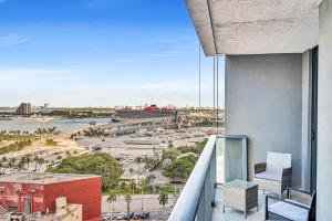a balcony with a view of a city at Waterline Corner Vies 2Br 2BA Suites in Miami