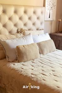 En eller flere senge i et værelse på Chill House Con Pileta