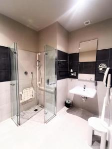 Koupelna v ubytování La Dolce Vita Hotel