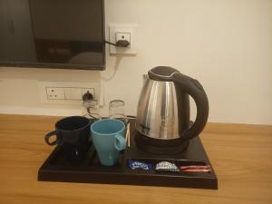 Facilități de preparat ceai și cafea la The Royal Pavilion Hotel +1 fotografie