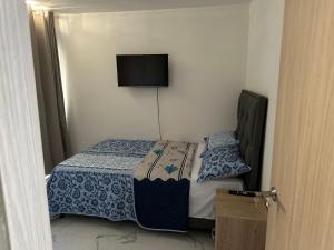 Postel nebo postele na pokoji v ubytování Tu viaje y tu hogar