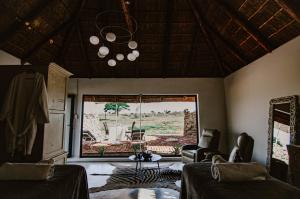 Χώρος καθιστικού στο Morakane Safari Lodge