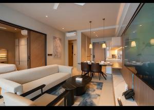 Гостиная зона в Antara 2 bedroom 9 min walk to genting 9Pax