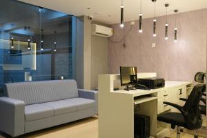 Posezení v ubytování Elite Group Mysore