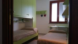 Postel nebo postele na pokoji v ubytování Bagnacci