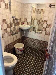 Koupelna v ubytování AD's Eco Bunker Homestay