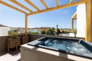 Фотография из галереи LOFTS the summer village apartments в городе Mármara